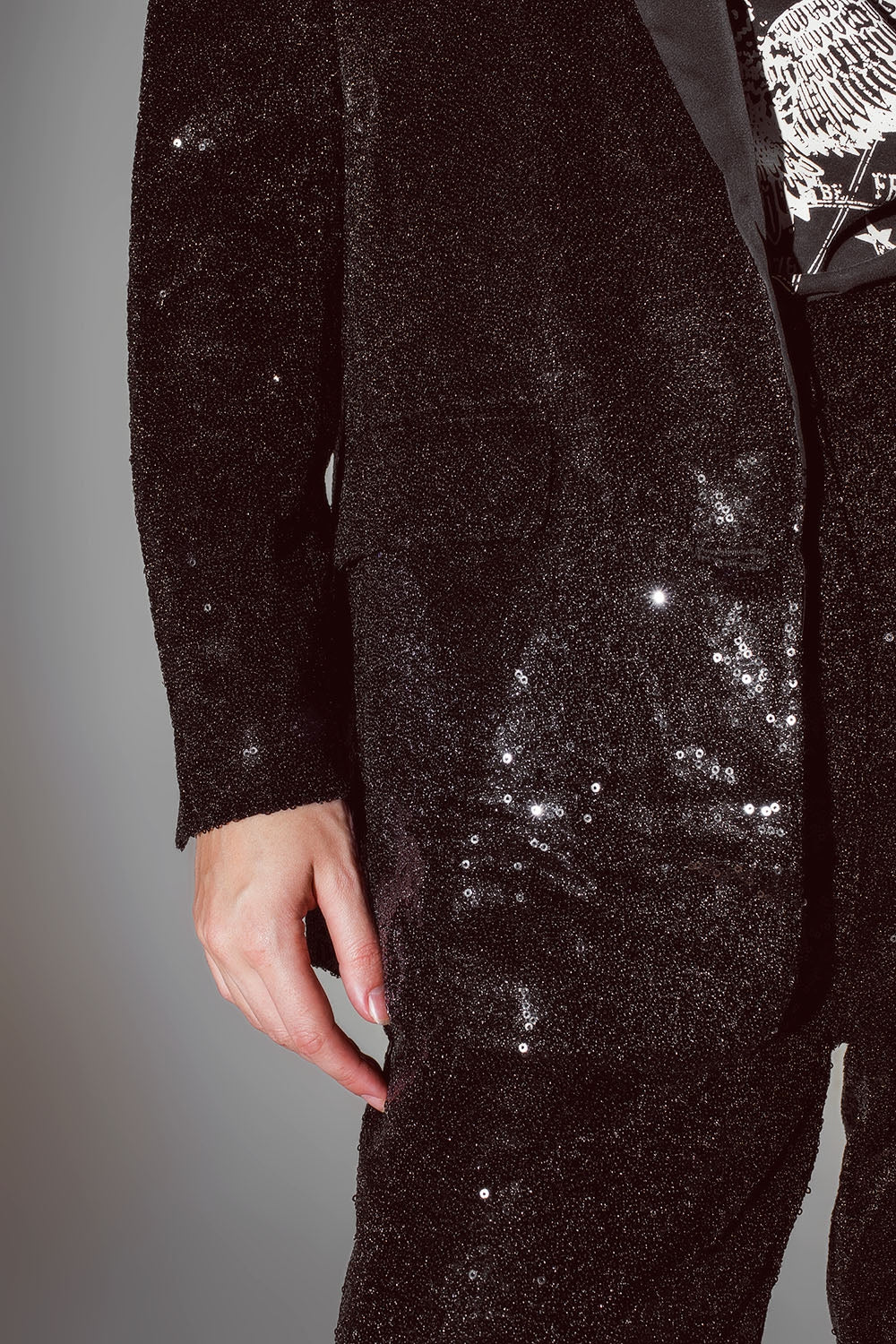 Blazer de lentejuelas negras con solapas de satén
