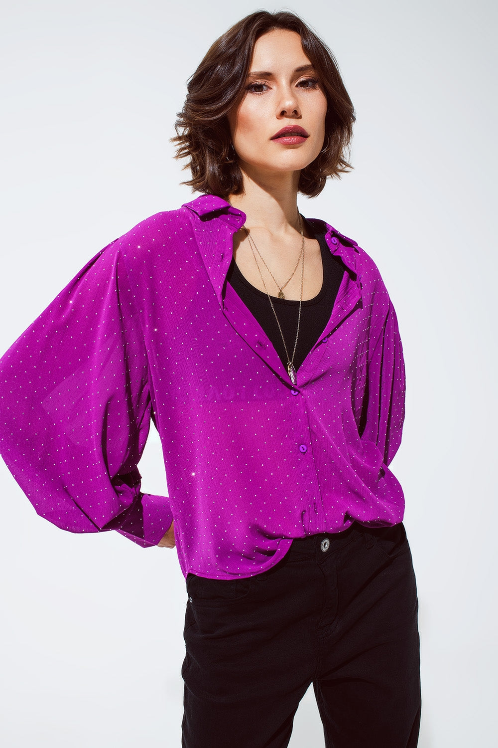 Blusa en magenta con detalle de strass