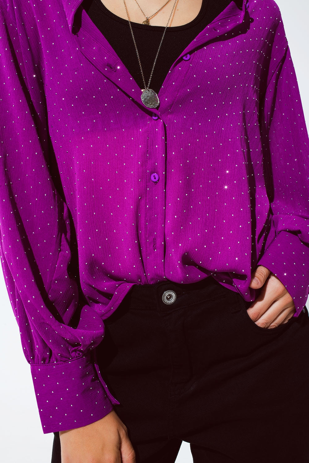 Blusa en magenta con detalle de strass