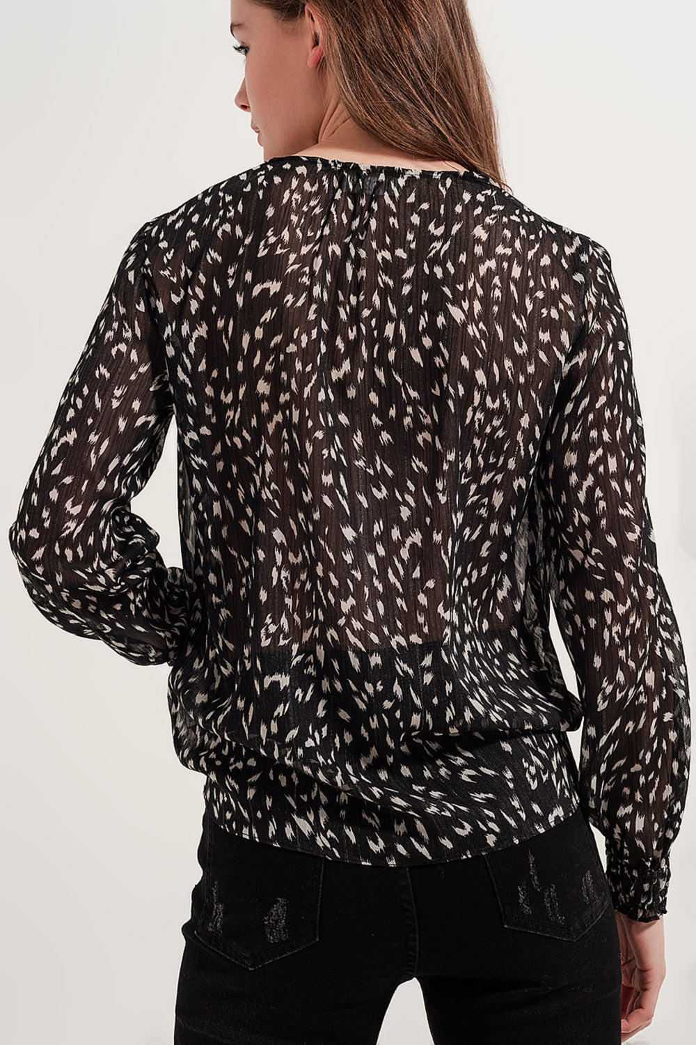 Blusa transparente de manga larga con estampado