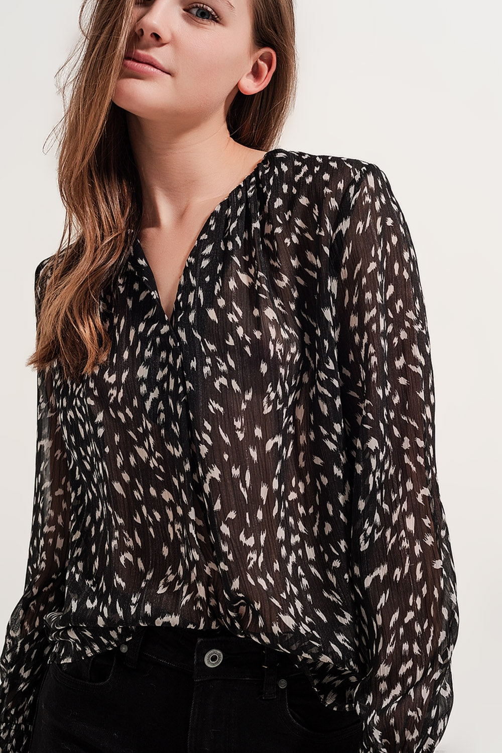 Blusa transparente de manga larga con estampado