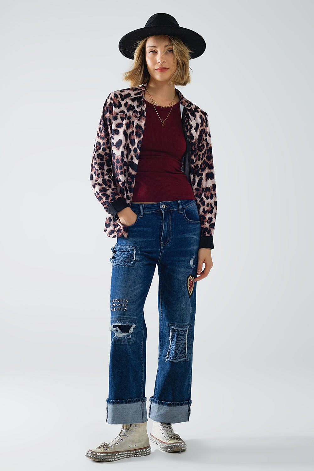 camisa de leopardo con detalle de raso negro