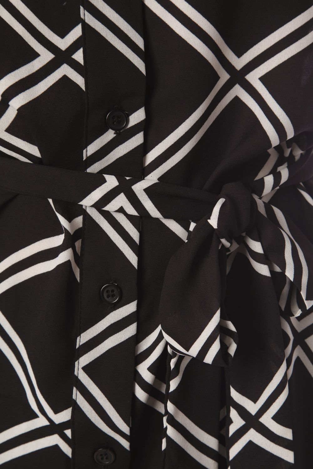 Camisa larga con diseño a cuadros negro