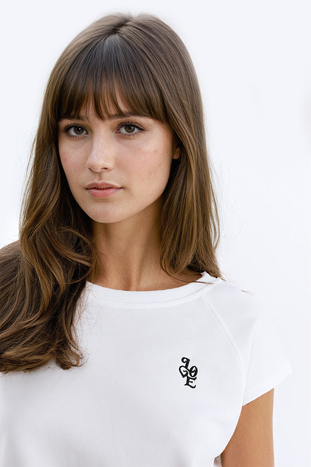 Camiseta con cuello redondo y logotipo Love en el pecho en blanco en punto de pique