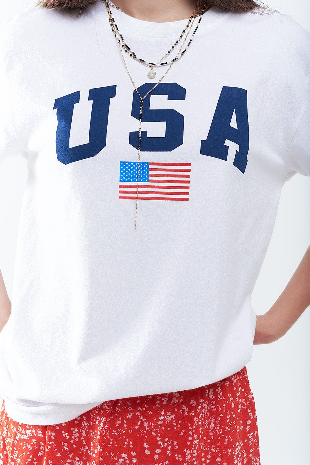Camiseta larga holgada blanca con logotipo de USA