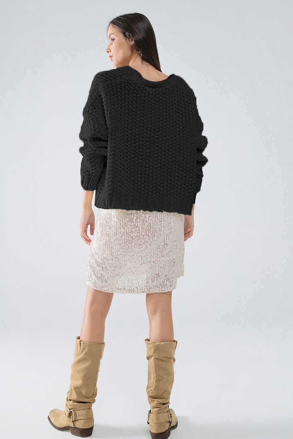 Chaqueta negra oversize de punto grueso con bolsillos