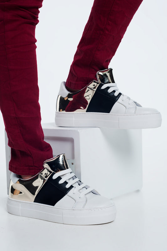 Q2 Chunky sneakers en negro y dorado