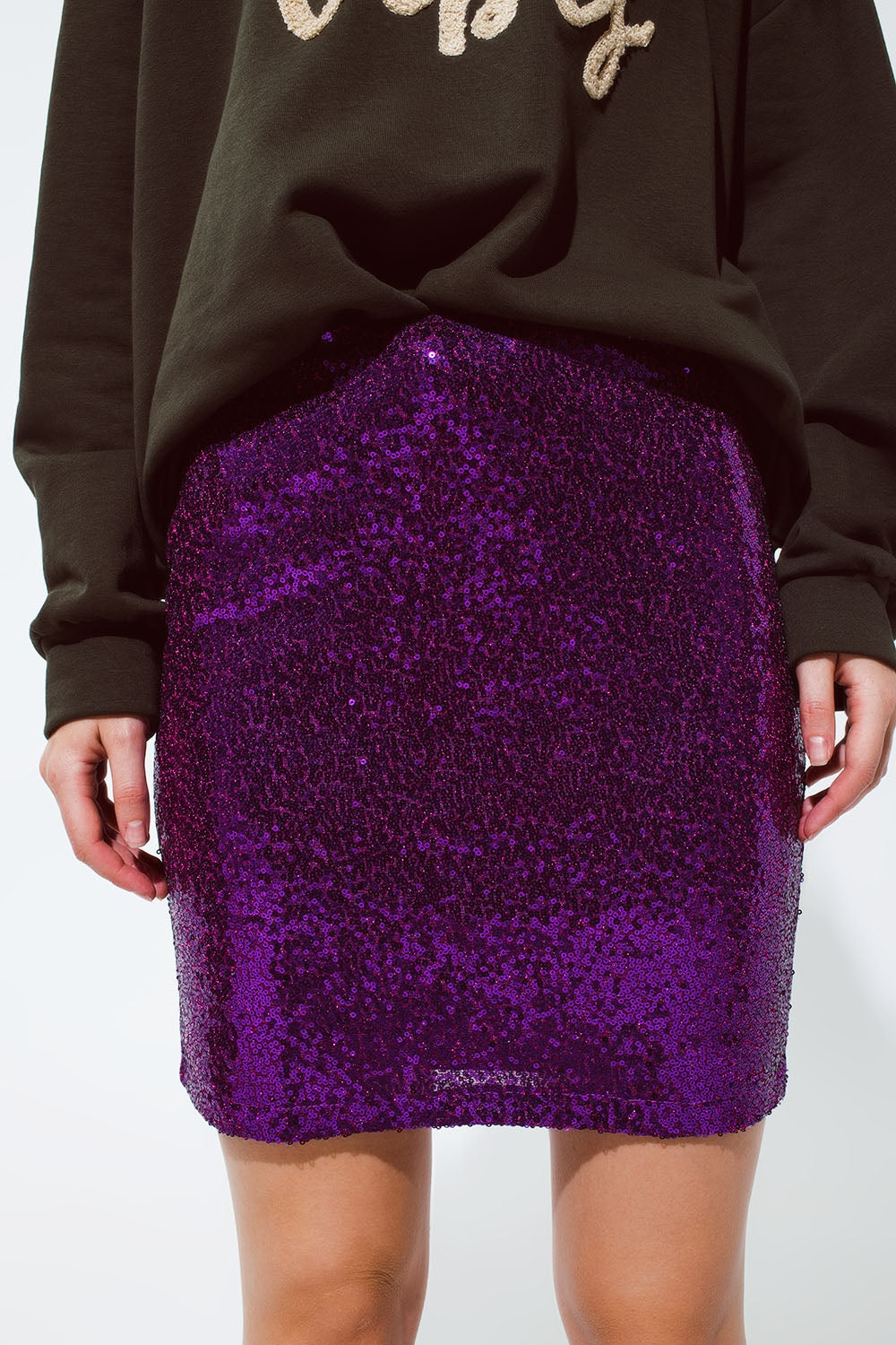 Falda mini de lentejuelas en color morado