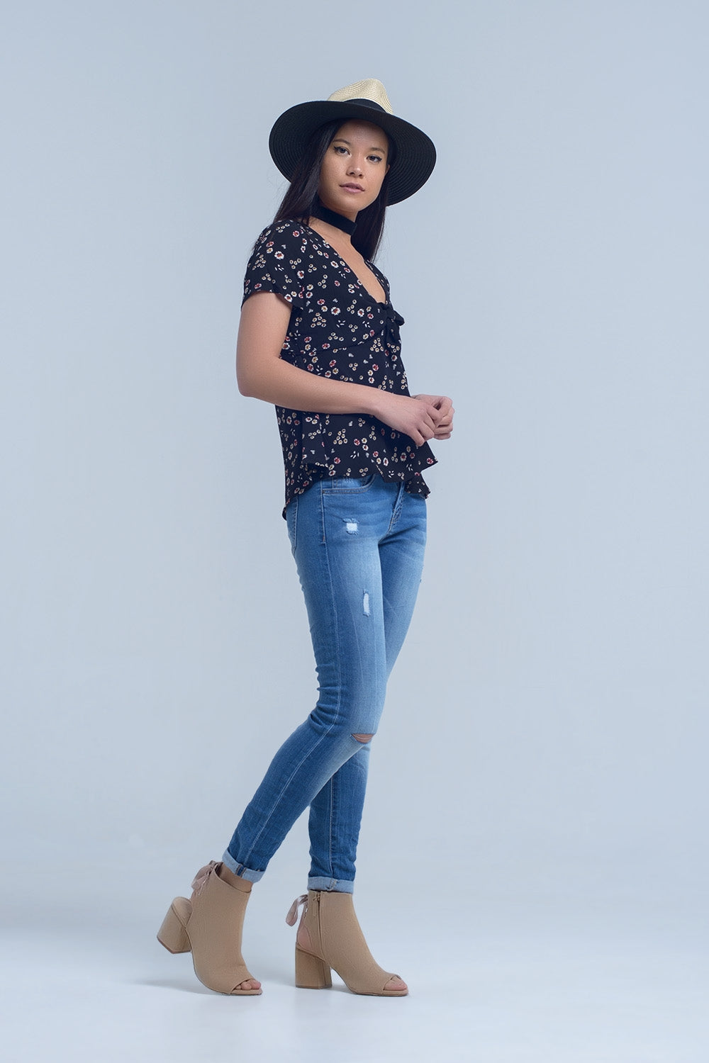 Jeans skinny con rodillas rasgadas