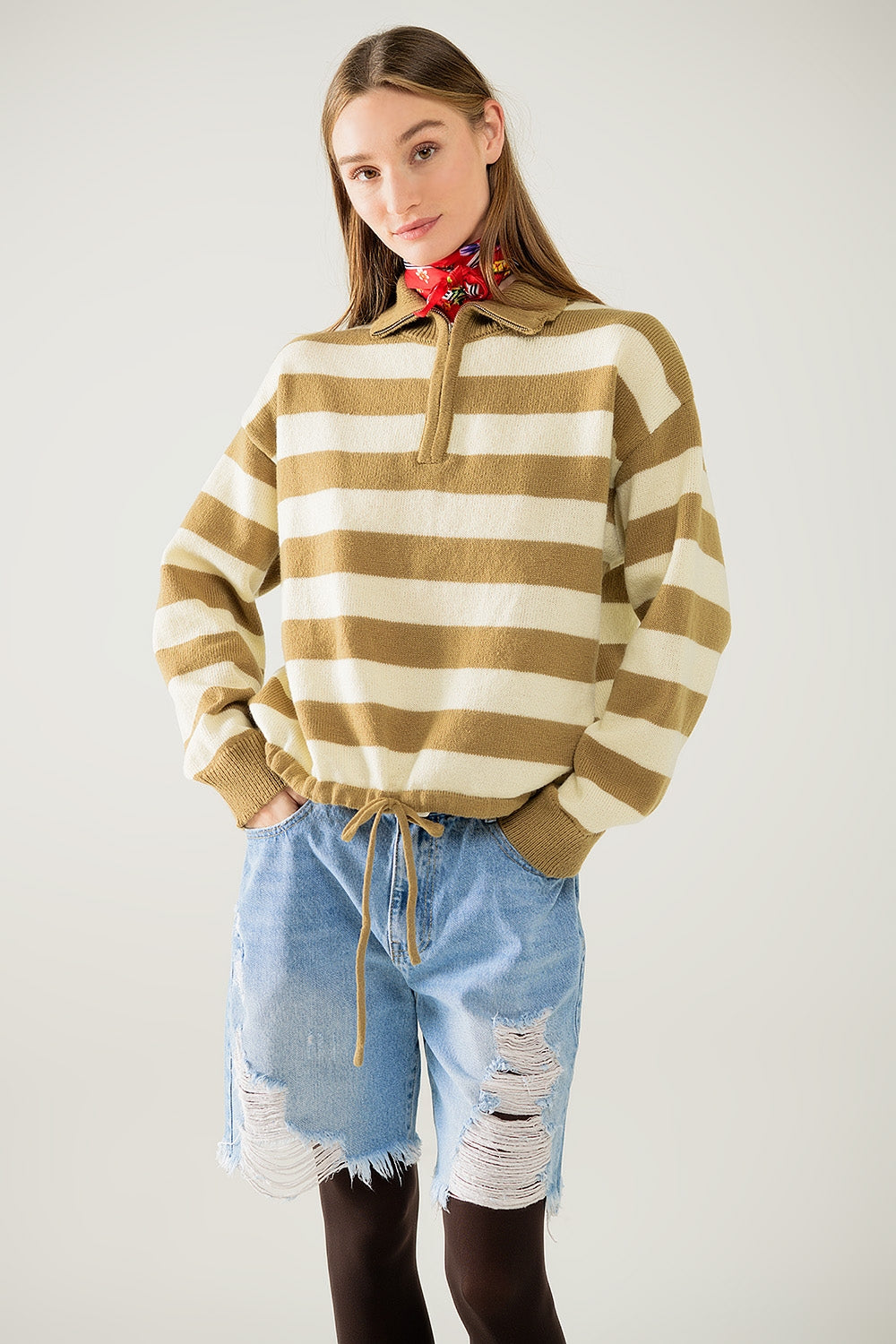 Jersey beige a rayas con cierre de cremallera