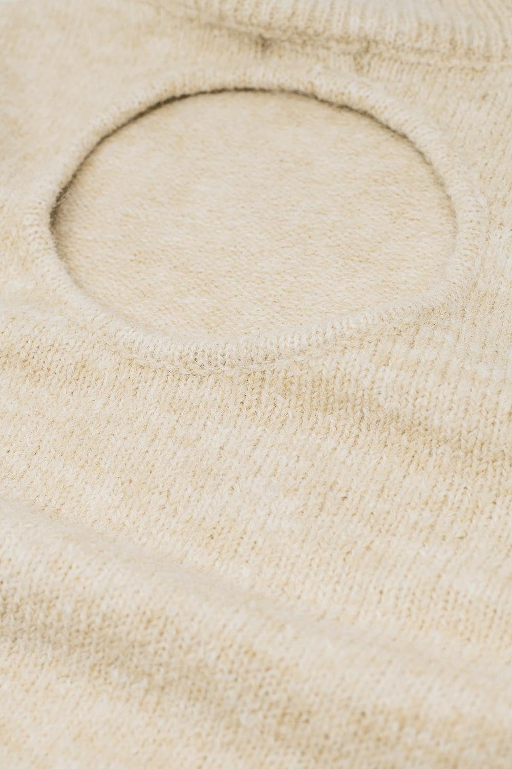 Jersey beige de manga larga con detalle de espalda abierta