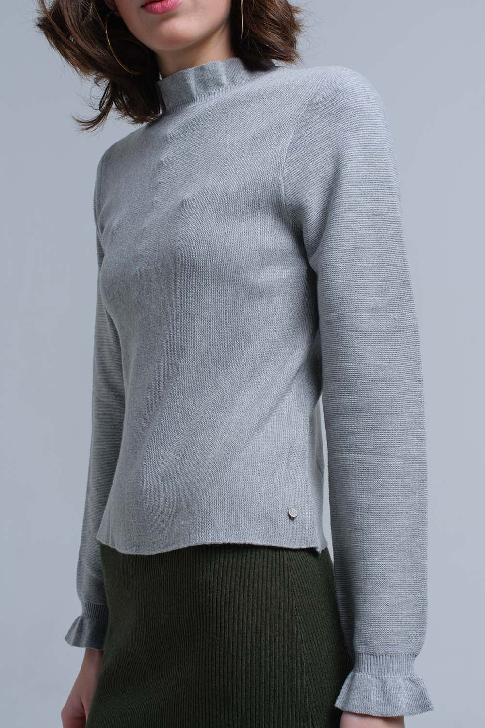 Jersey con volantes en gris