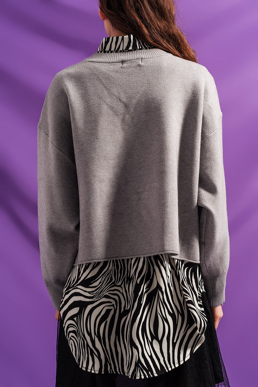 Jersey corto gris con mangas murciélago