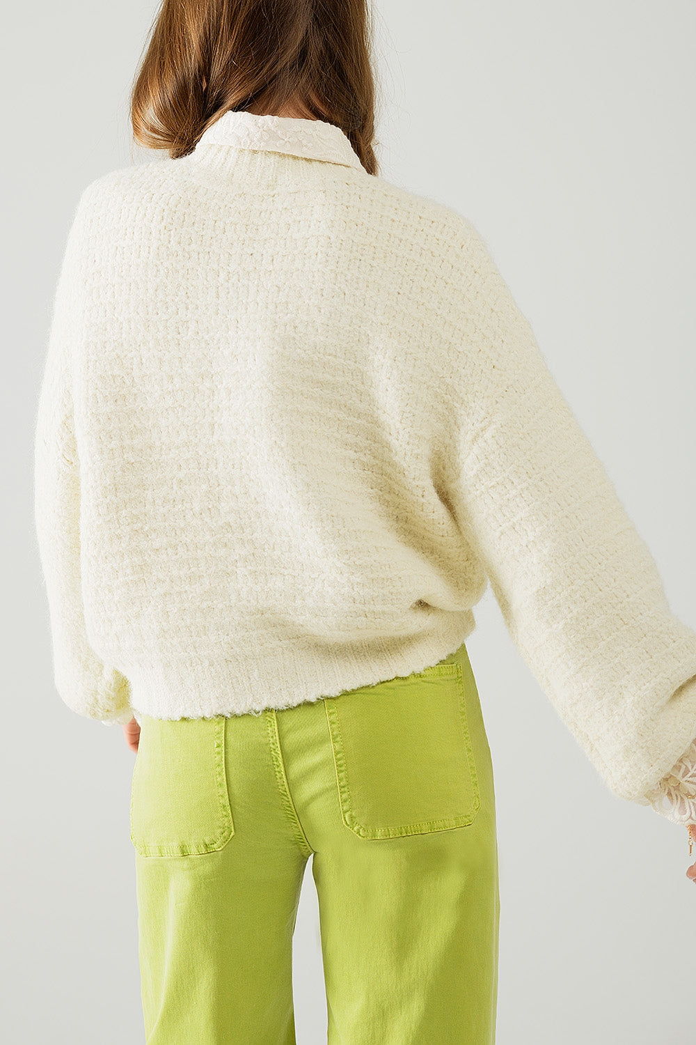 Jersey de punto beige con mangas globo