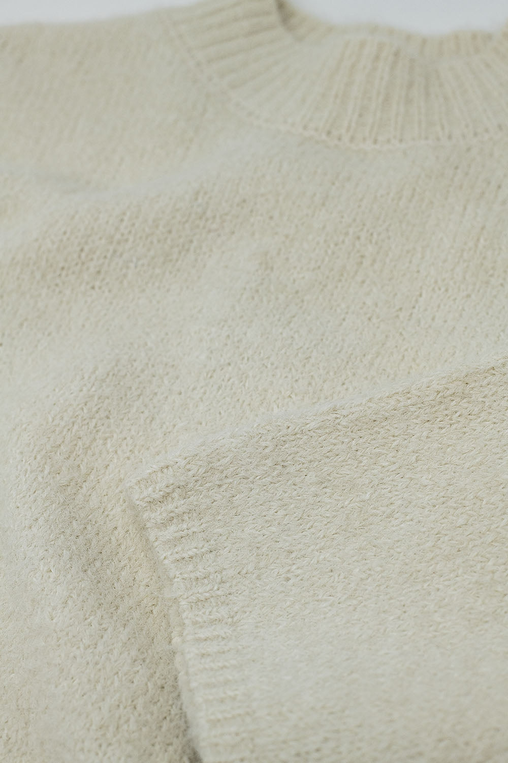 Jersey Relaxed de manga 3/4 y cuello redondo en color crema