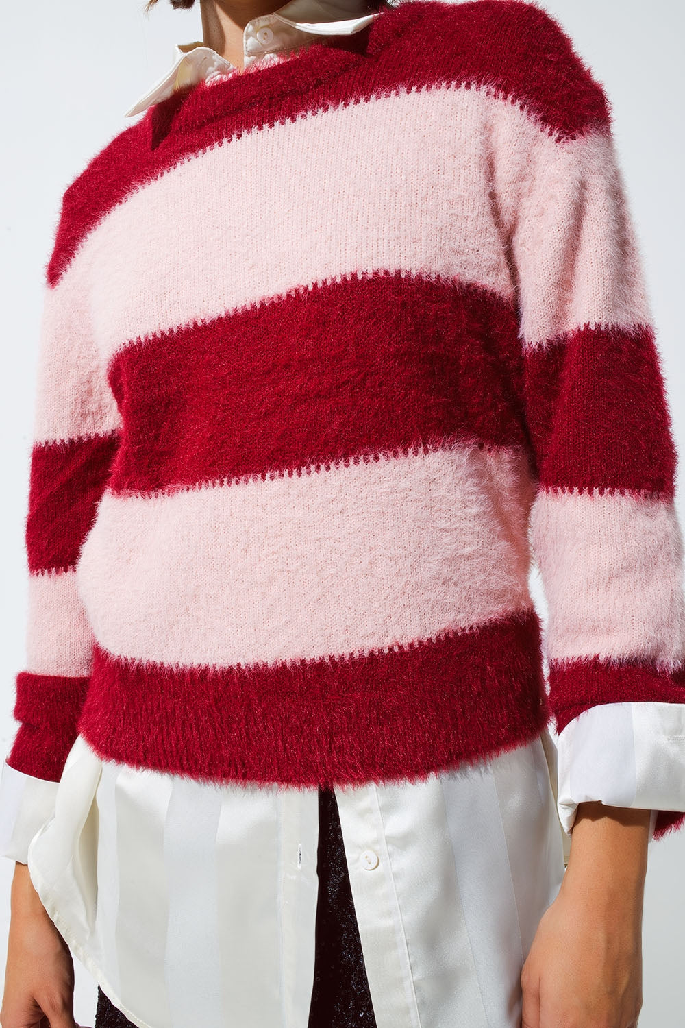 Jersey rosa con rayas y cuello redondo