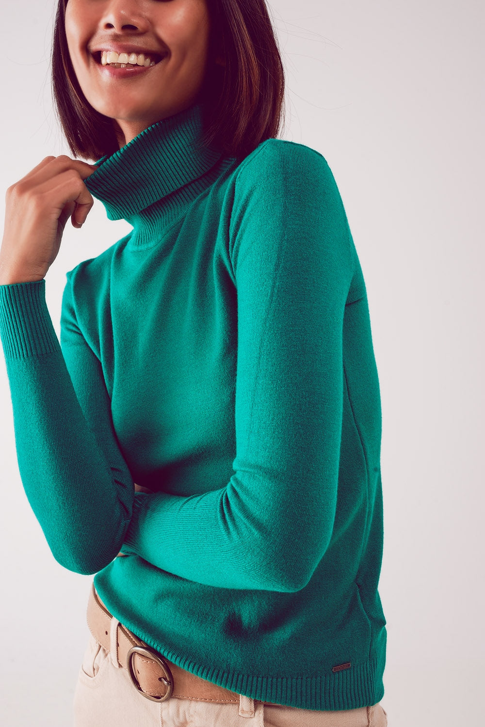Jersey verde con cuello alto