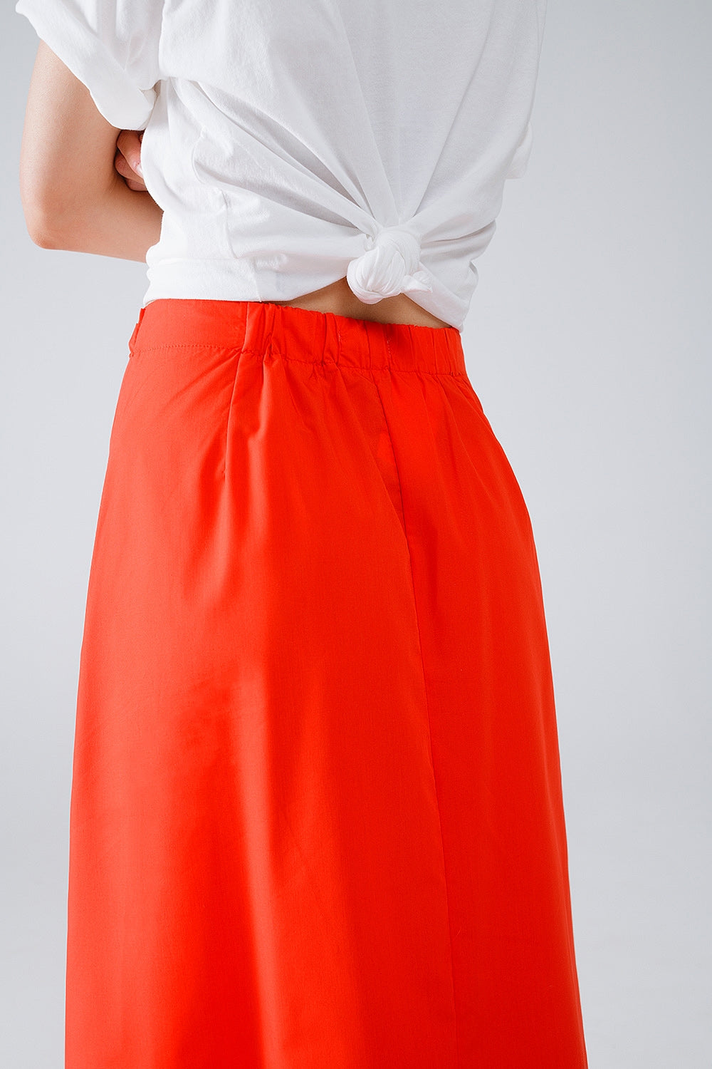 Maxi falda de popelina naranja con detalle de nudo en la cintura