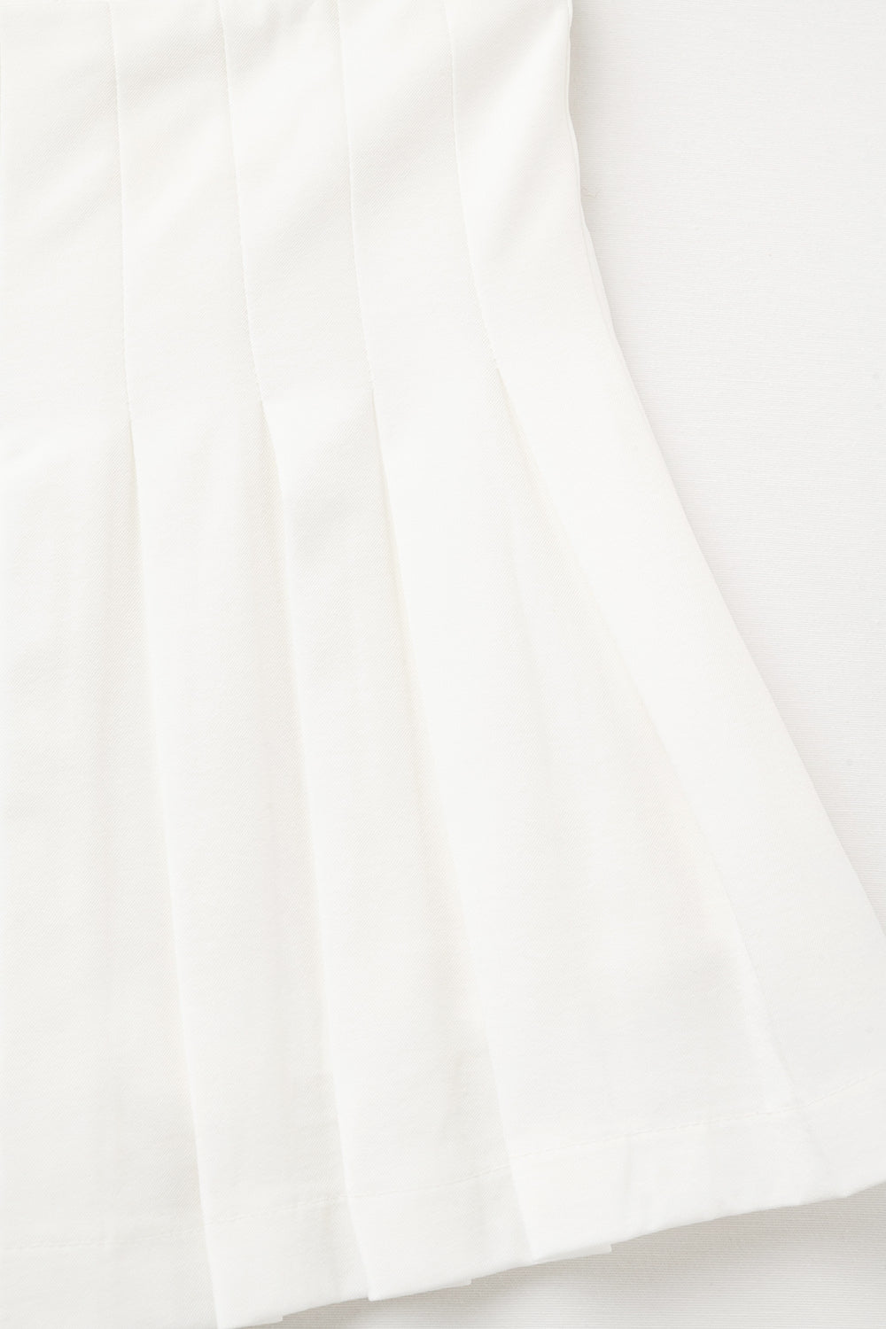 mini falda plisada blanca