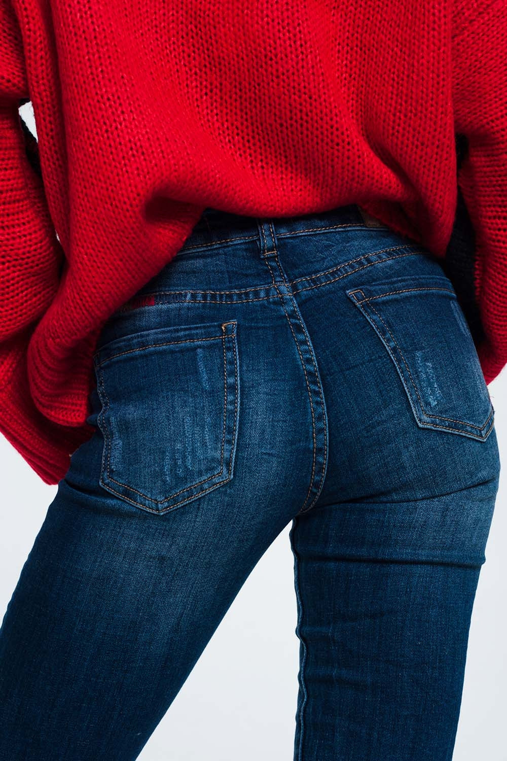 Pantalon vaquero slim con detalle de hilo en colores