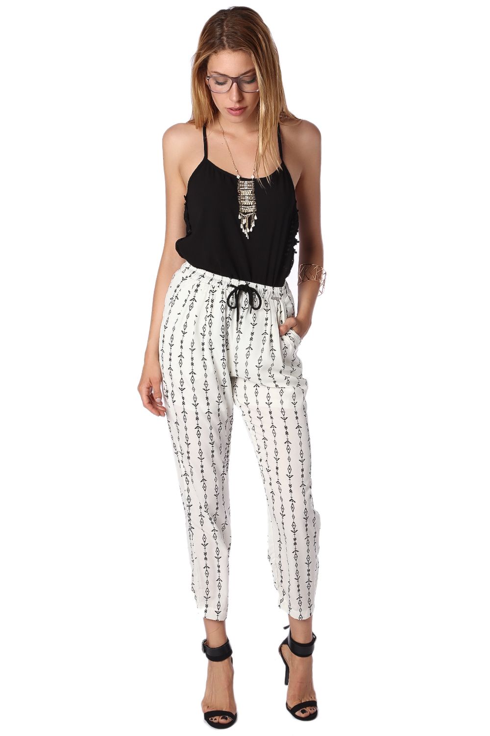 Pantalones crema con estampado azteca en contraste