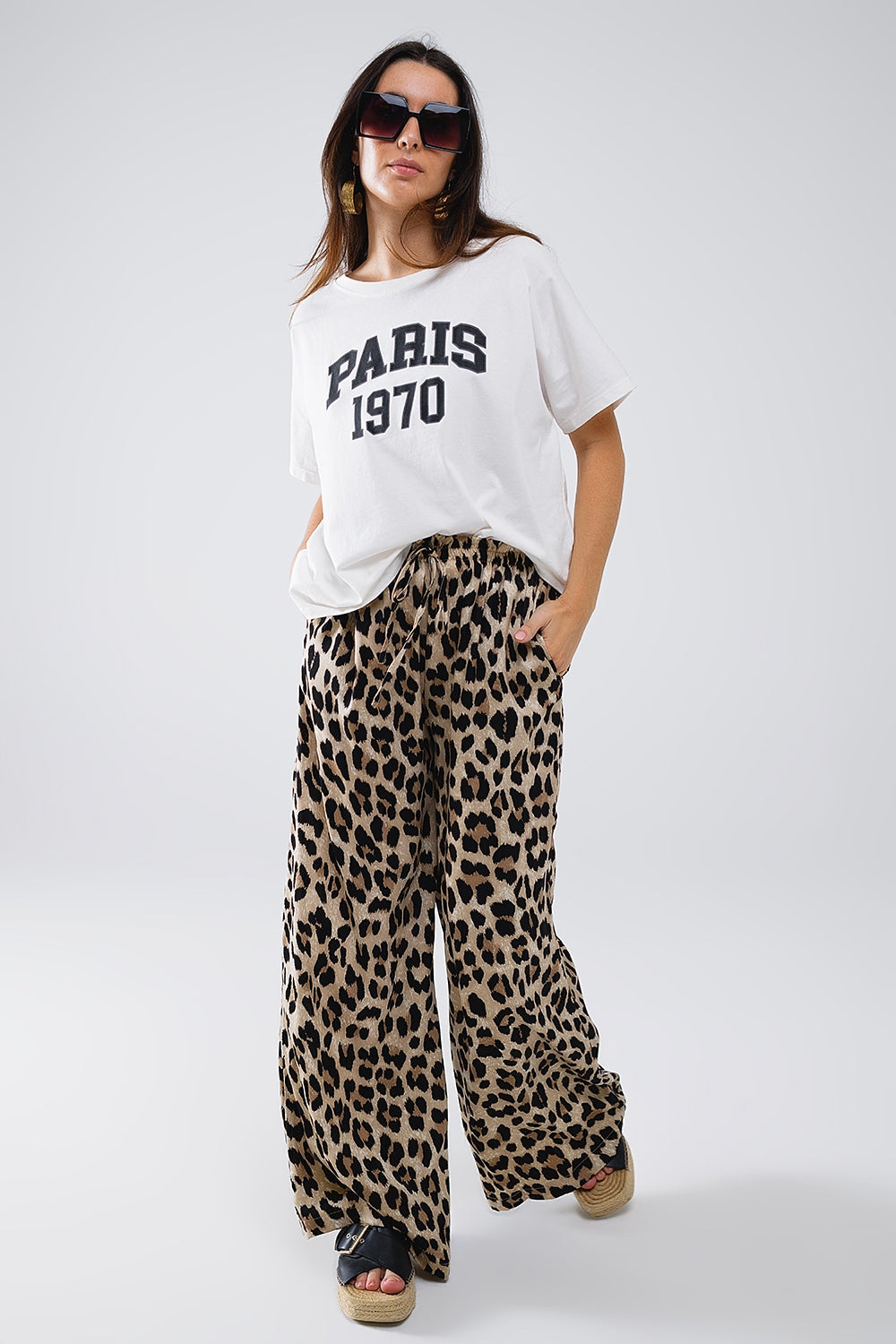 Pantalones con estampado de leopardo cordón y bolsillos