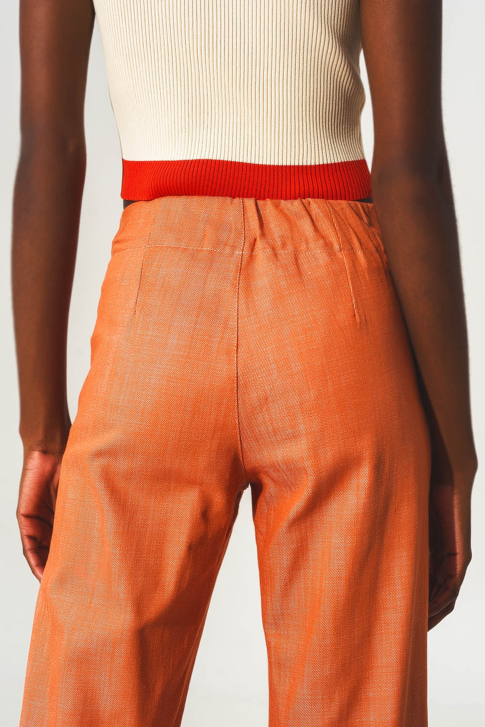 Pantalones en naranja estilo marine con botones