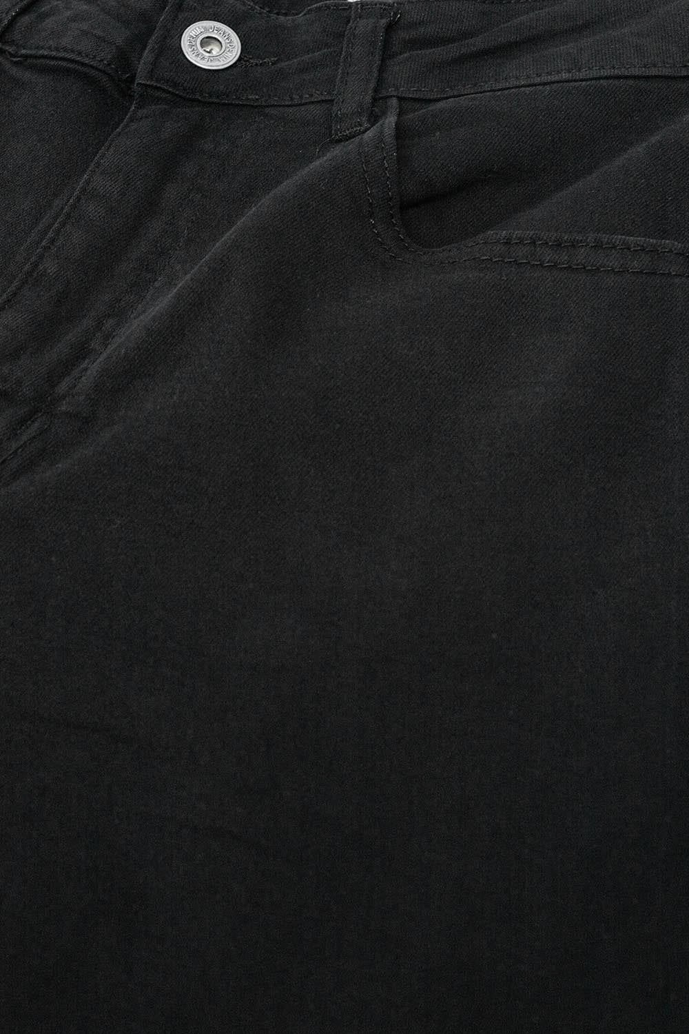 Pantalones negros de cintura alta y pernera ancha