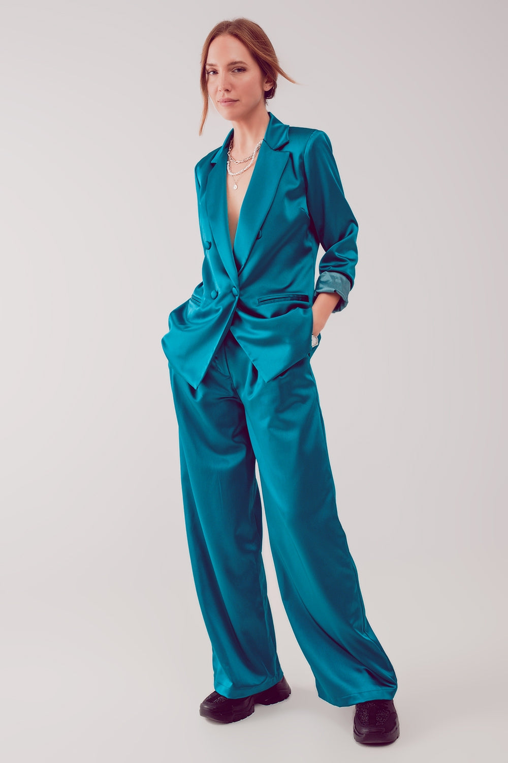 Pantalones palazzo con pinzas en turquesa