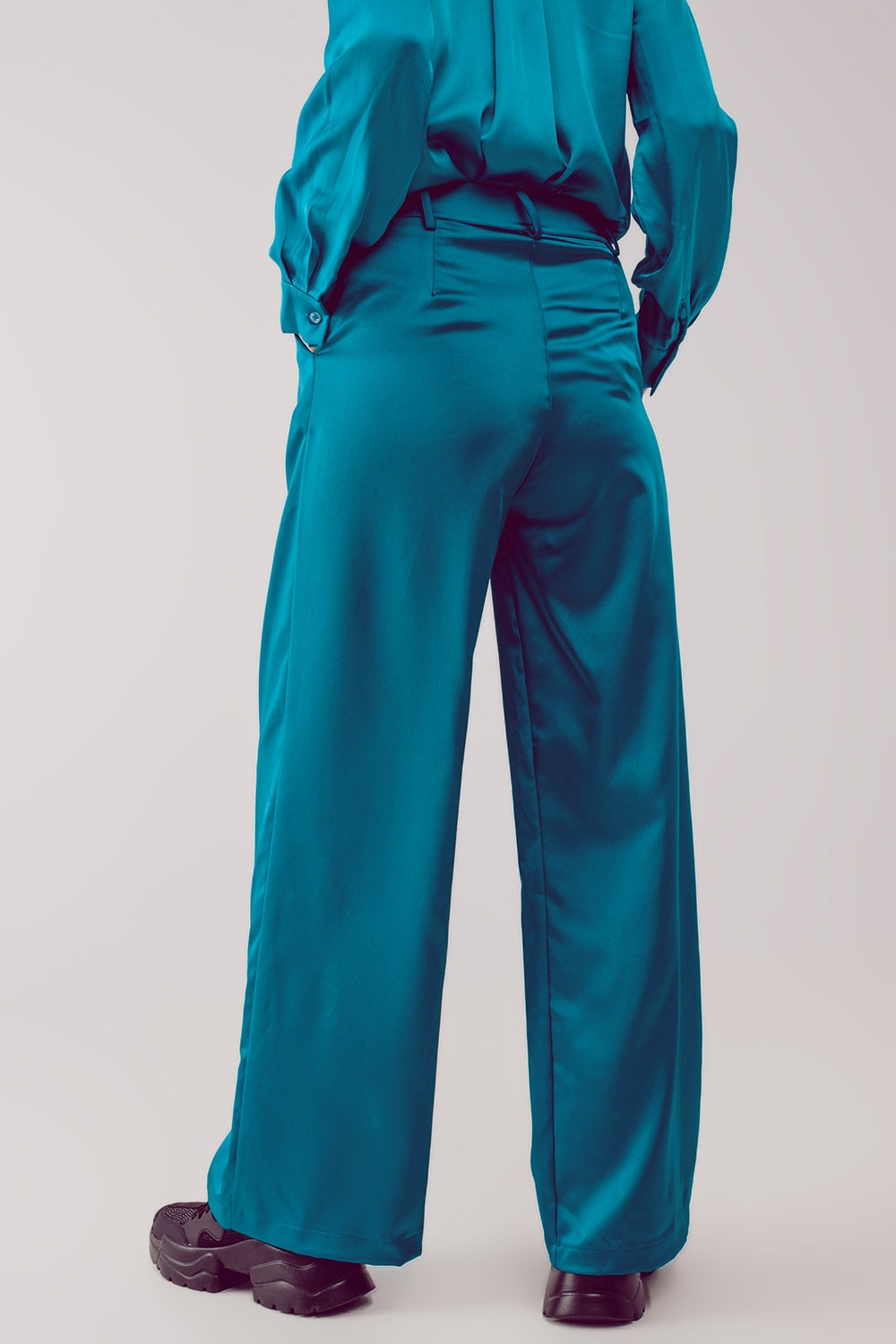 Pantalones palazzo con pinzas en turquesa