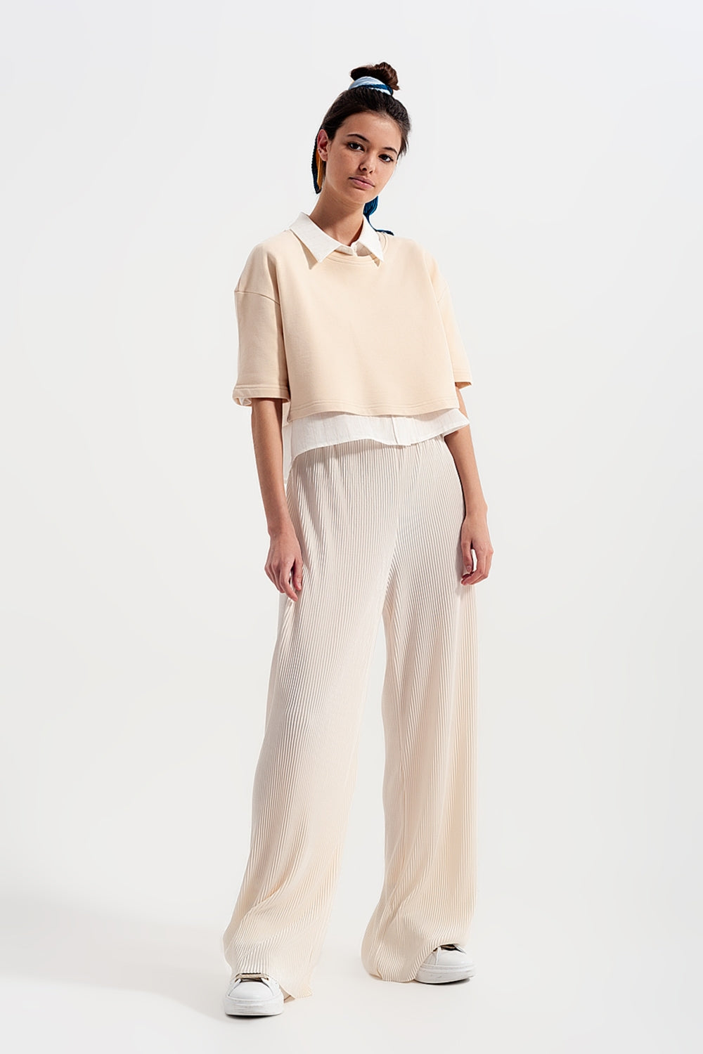 Pantalones plisados estilo culottes en color crema
