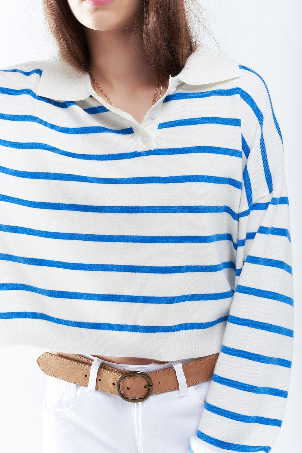 Polo de punto suave con rayas azules