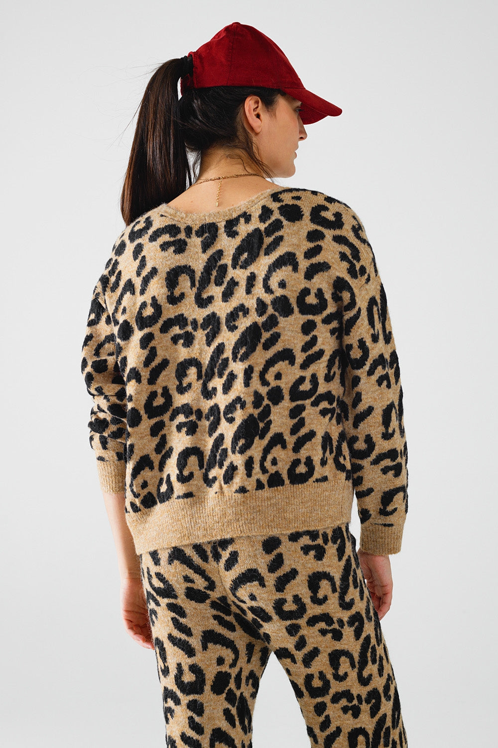 Rebeca de manga larga con estampado de leopardo y detalle de lazos