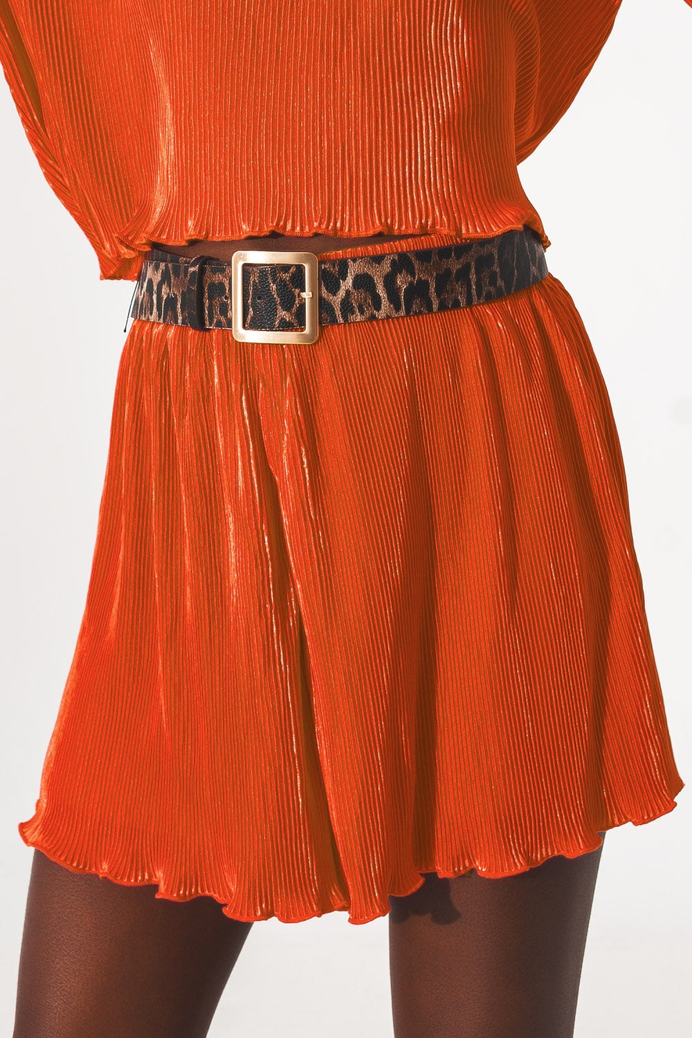 Shorts plisados en naranja