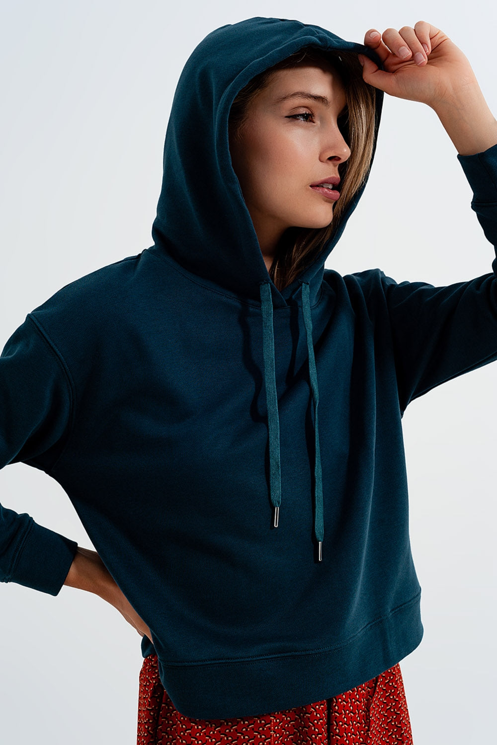 Sudadera verde con capucha