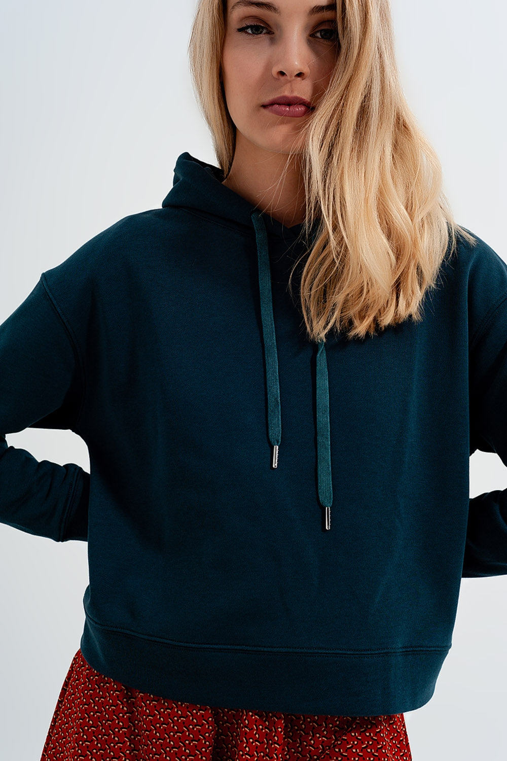 Sudadera verde con capucha