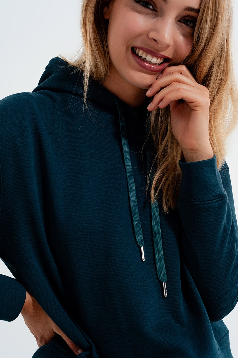 Sudadera verde con capucha
