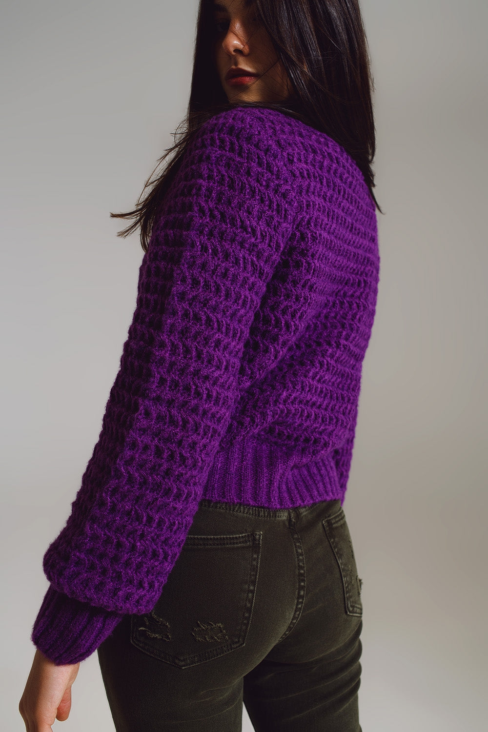 Suéter holgado de punto gofre con cuello alto en color morado