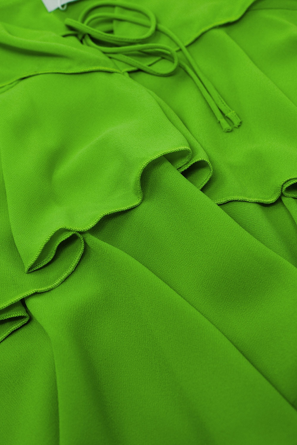 Top de volantes con tirantes finos en verde