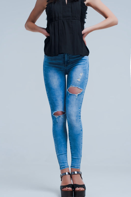 Q2 Vaqueros ajustados con roturas pronunciadas