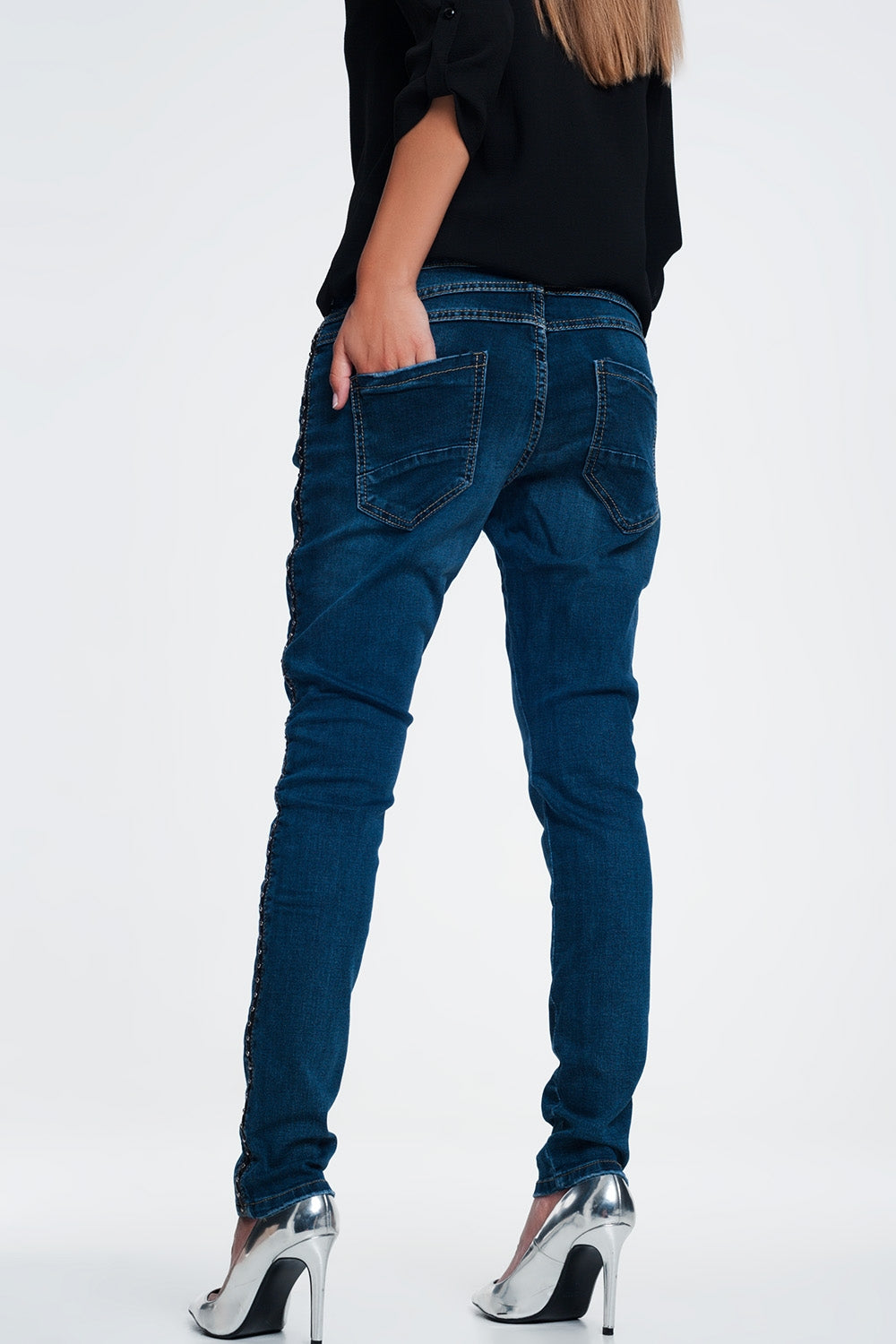 Vaqueros con tachuelas con tira lateral polipiel