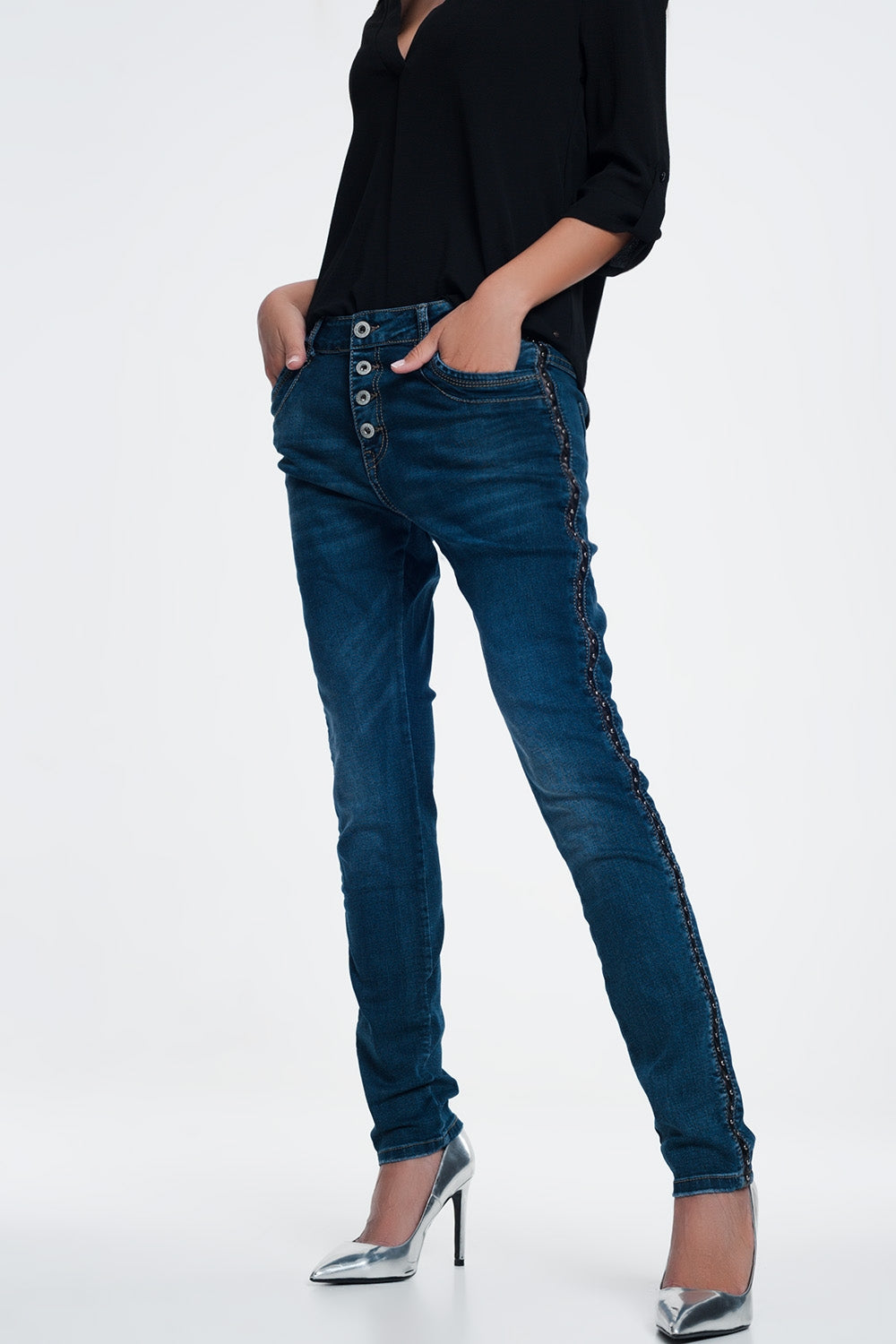 Vaqueros con tachuelas con tira lateral polipiel