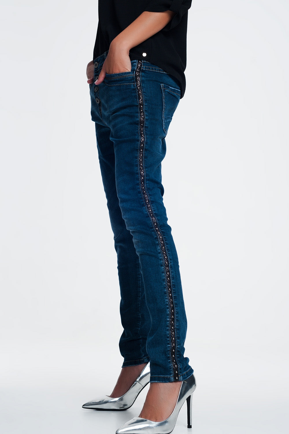 Vaqueros con tachuelas con tira lateral polipiel