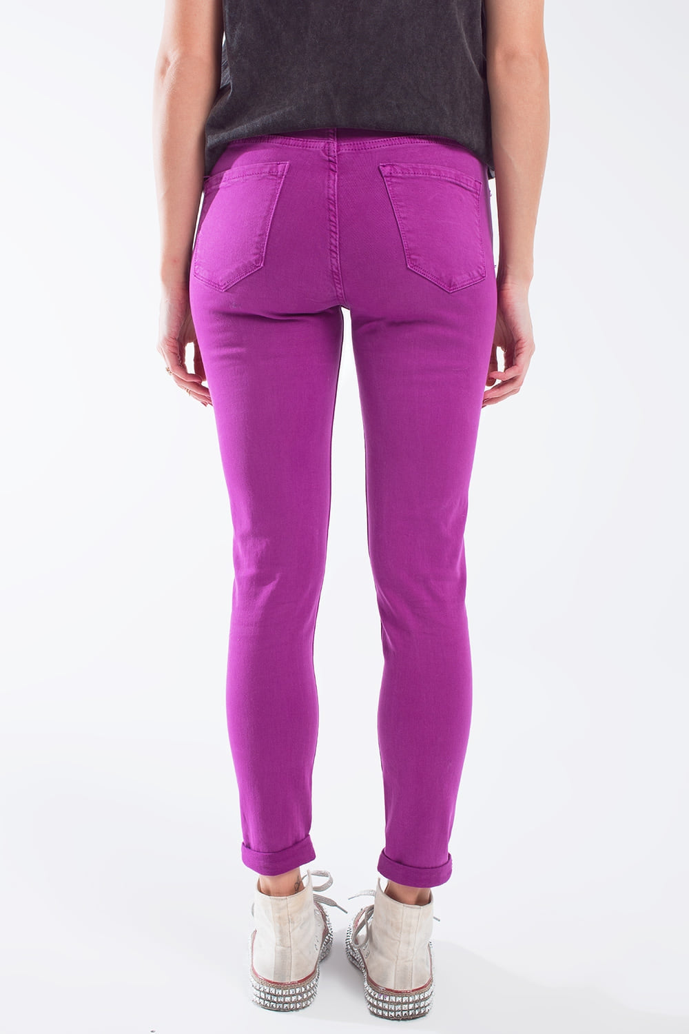Vaqueros super ajustados tobilleros fucsia con suaves arrugas