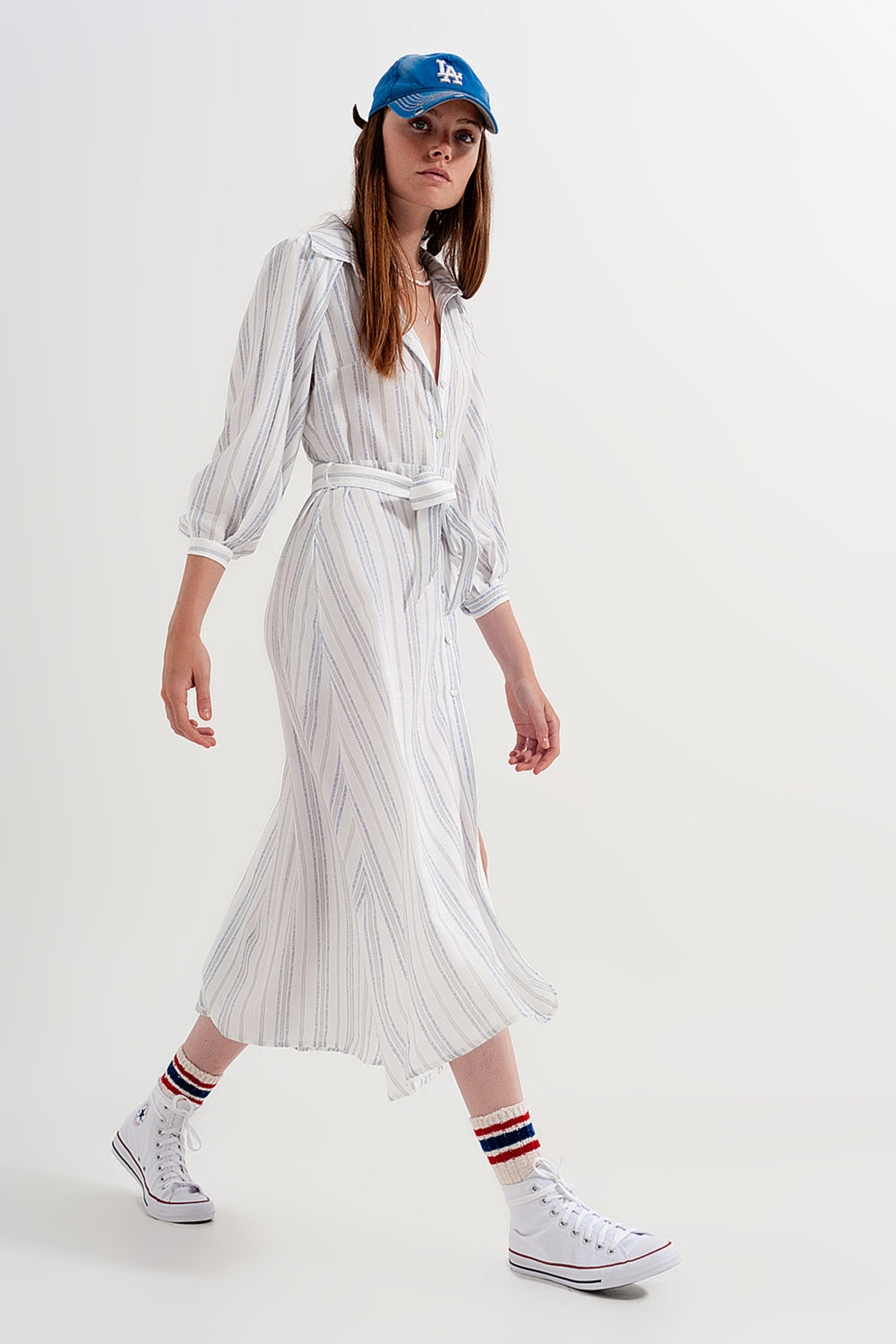 Vestido amplio con botones y diseño a rayas