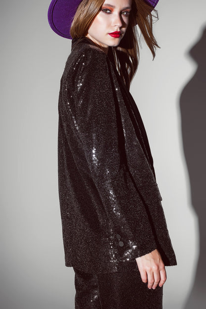 Blazer de lentejuelas negras con solapas de satén