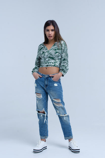 Blusa con estampado de hojas verde y escote pronunciado