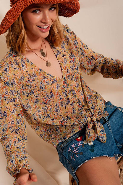 Blusa con estampado floral metalizado en verde