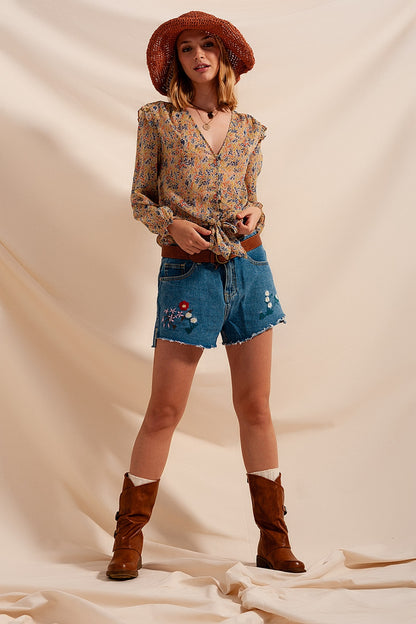 Blusa con estampado floral metalizado en verde