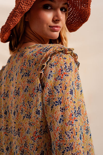 Blusa con estampado floral metalizado en verde